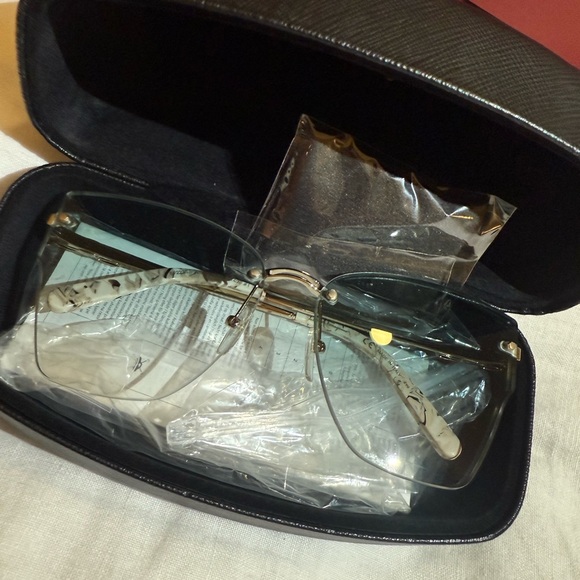 Authentic Salvatore Ferragamo sunglasses.